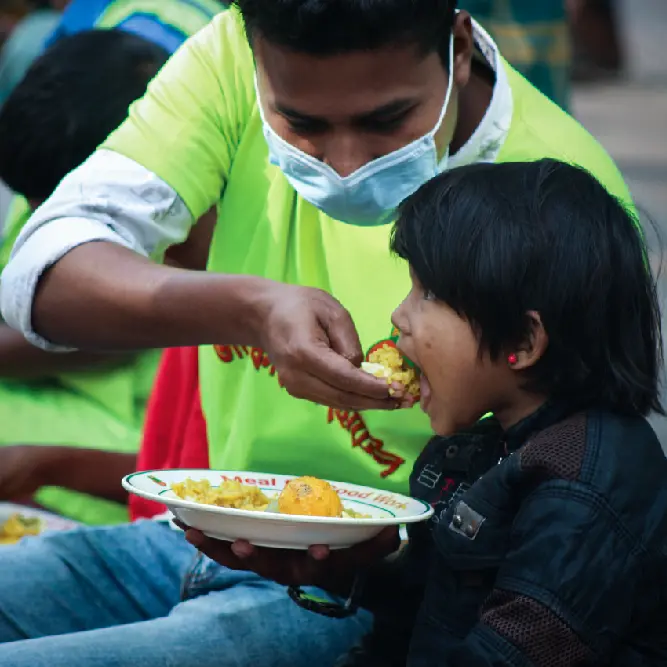 Happy children receiving support from volunteers